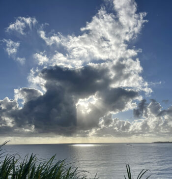 Sun Rays Peeking Onto Ocean